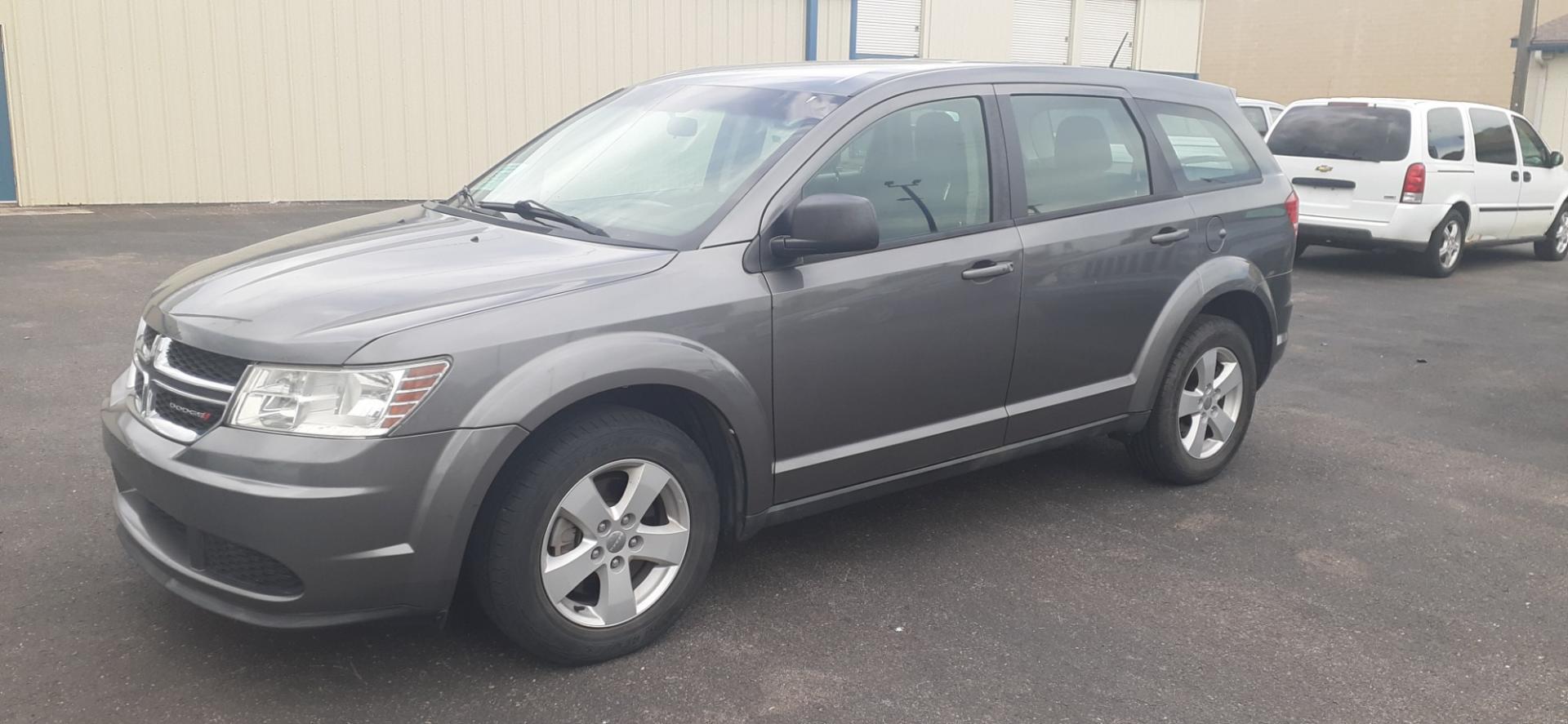 2013 Dodge Journey SE (3C4PDCAB0DT) with an 2.4L L4 DOHC 16V engine, 4-Speed Automatic transmission, located at 2015 Cambell Street, Rapid City, SD, 57701, (605) 342-8326, 44.066433, -103.191772 - CARFAX AVAILABLE - Photo#1